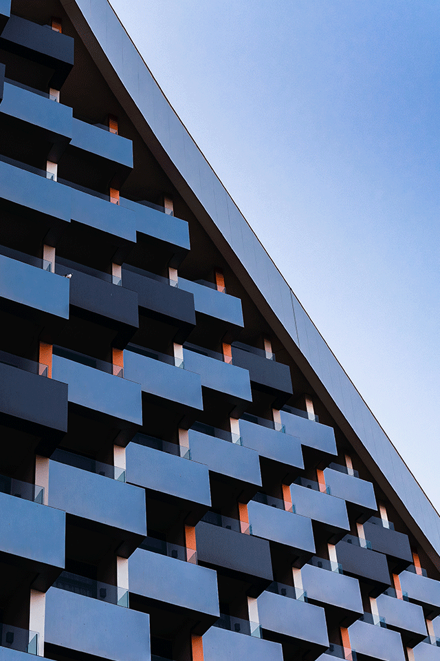 Laptop beside plant in vase