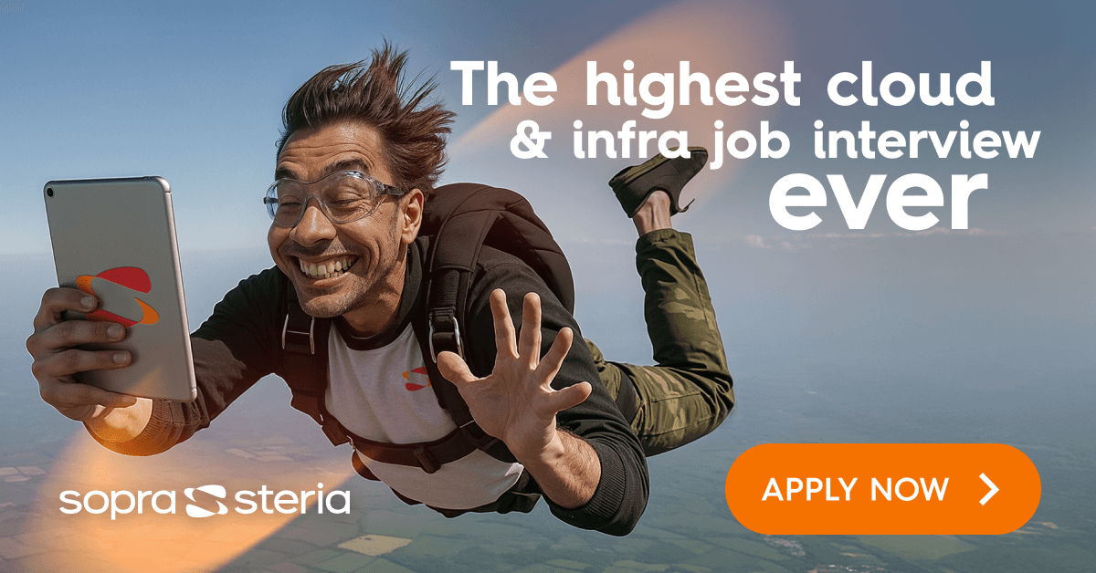 women sitting on a bed using a laptop