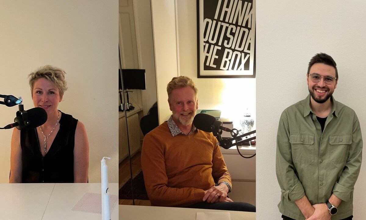 Three employee talking at a postcast recording