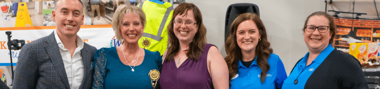 Westgate employees in a line, smiling