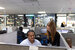 Westgate sales employees smiling in an office.