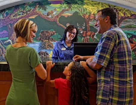 Guest services helping a family
