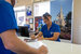 Smiling Westgate employee at a desk.