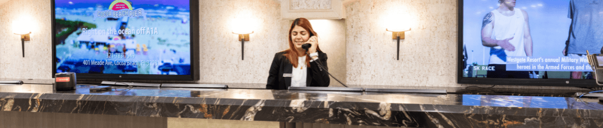 Westgate Resorts Front Desk team member on a call