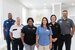 Westgate employees stood in a line smiling in different uniforms