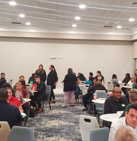 Recruiter interviewing a candidate at a Westgate hiring event