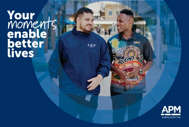 a circular overlay with two men walking down a street with text