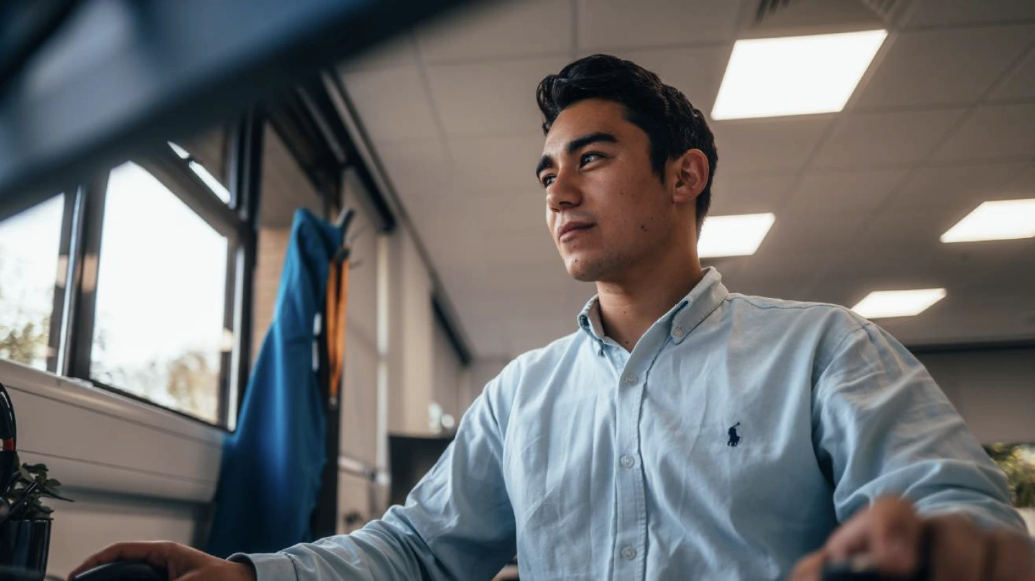 a man working behind a computer