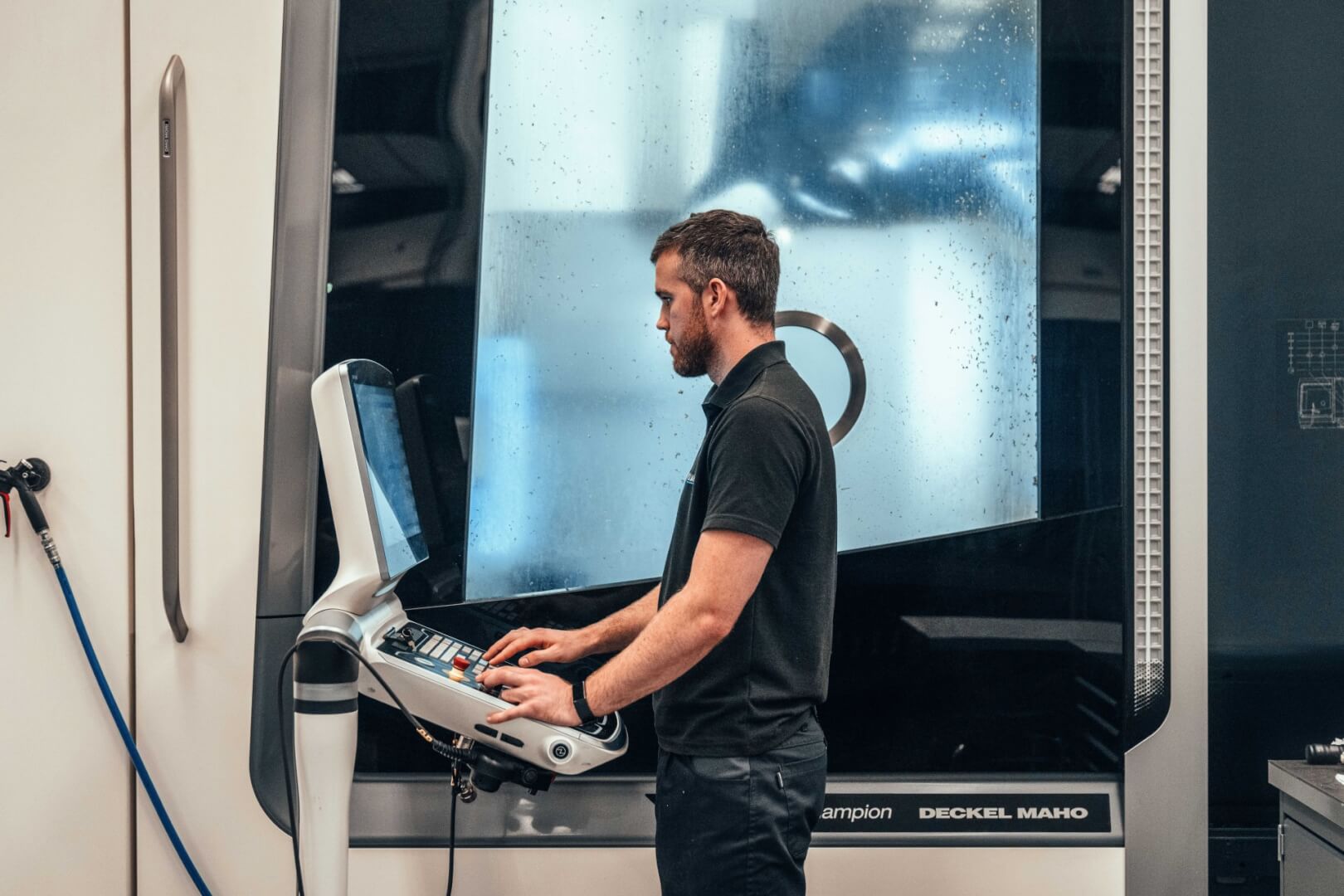 a man working behind a computer