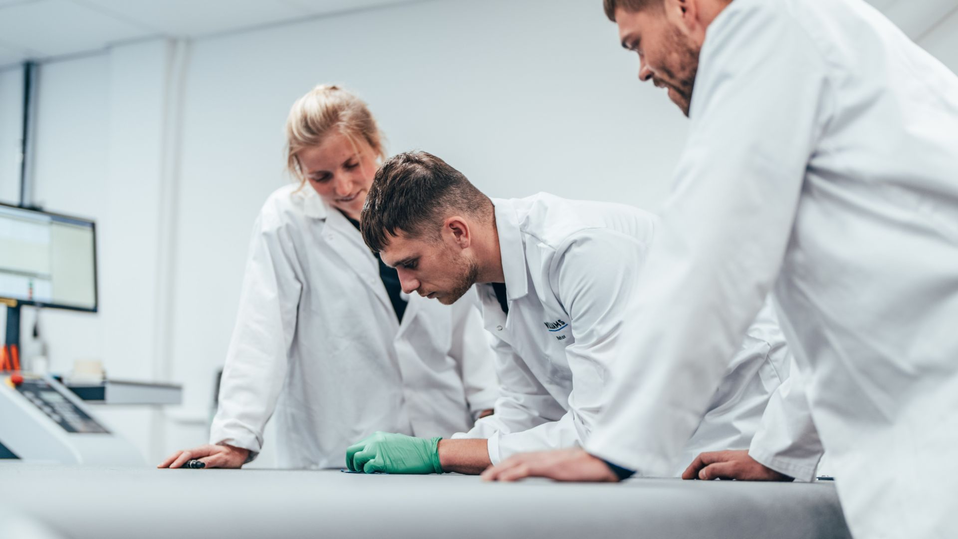 a man working behind a computer