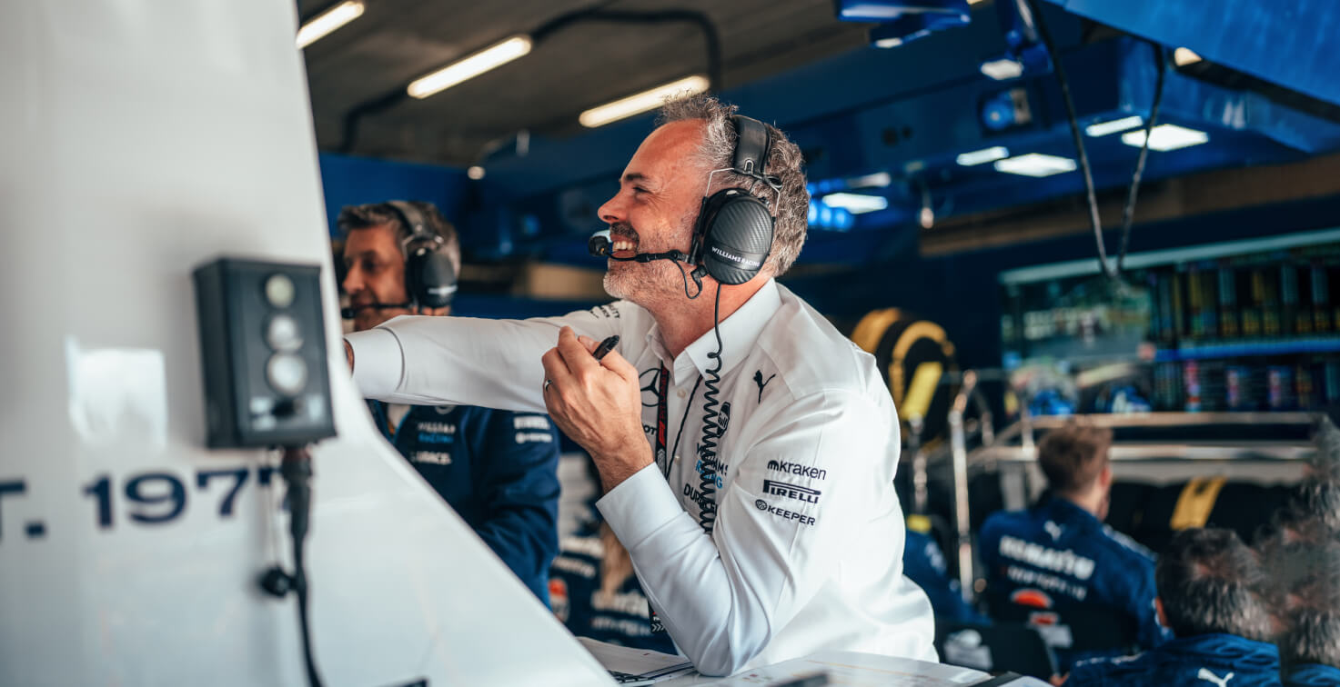 a man working behind a computer
