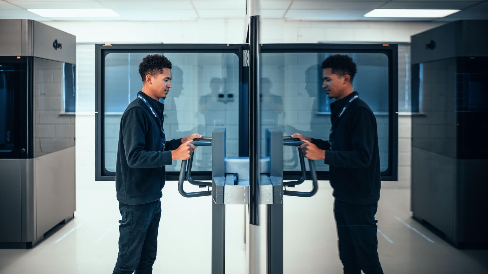 a man working behind a computer