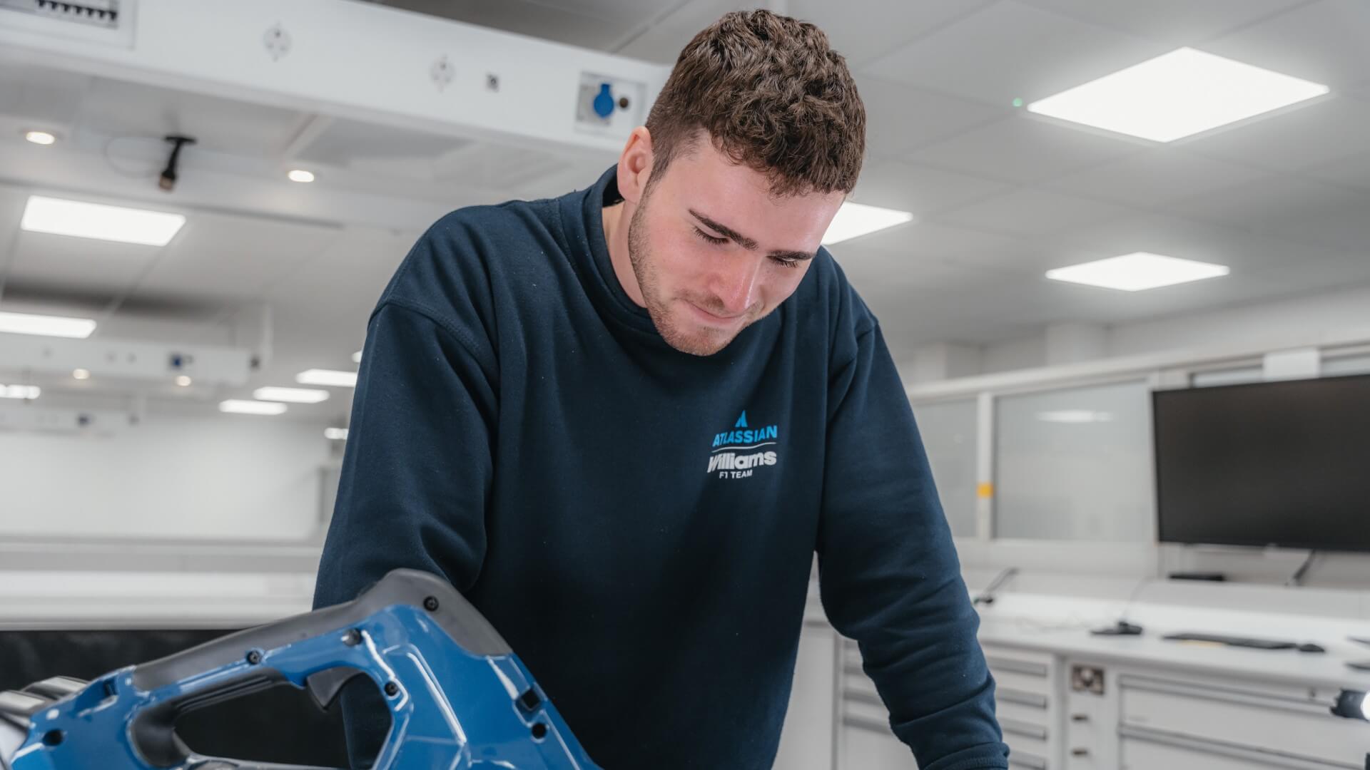 a man working behind a computer