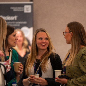 vet holding a small cat
