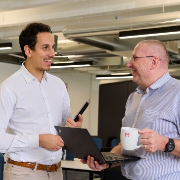 vet holding a small cat