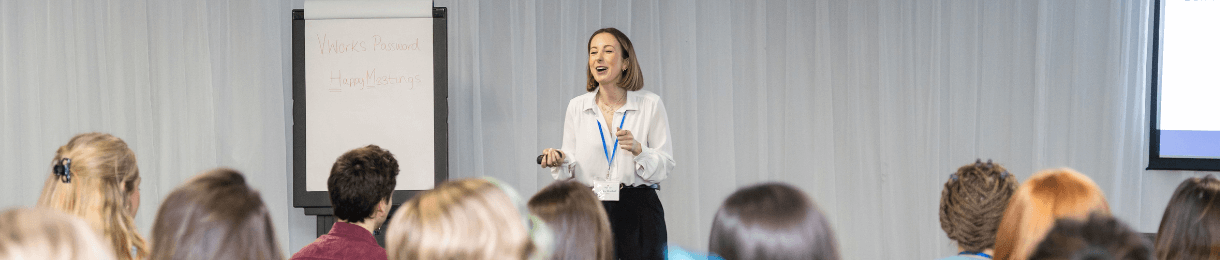 A lecturer presenting to a class