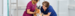 Two veterinary professionals examining a cat
