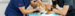 Ginger and white cat being examined at the vet.