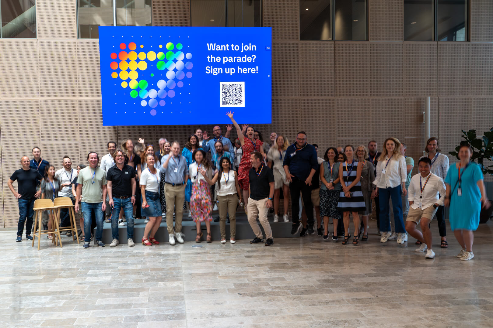 People jumping and looking into the camera