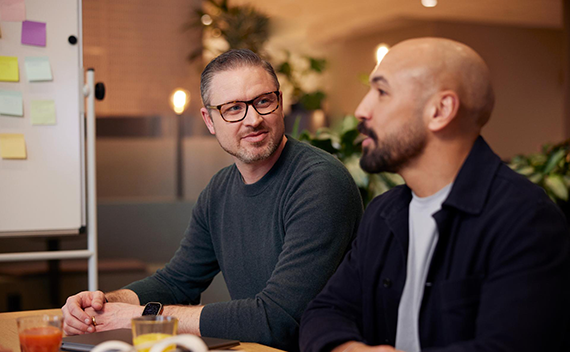 Two colleagues talking