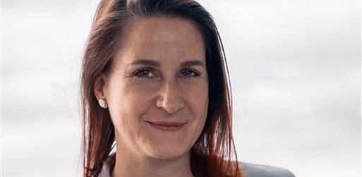 A woman smiling at the camera