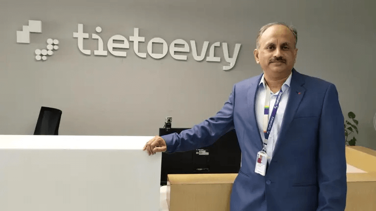 Sharanayya Kantikar standing in Tietoevry office