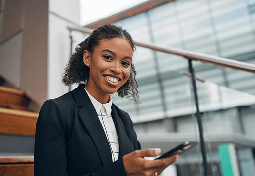 A woman looking into the camera smiling