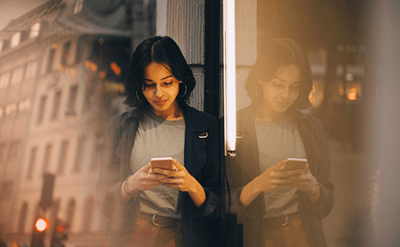 A woman ordering something on her phone