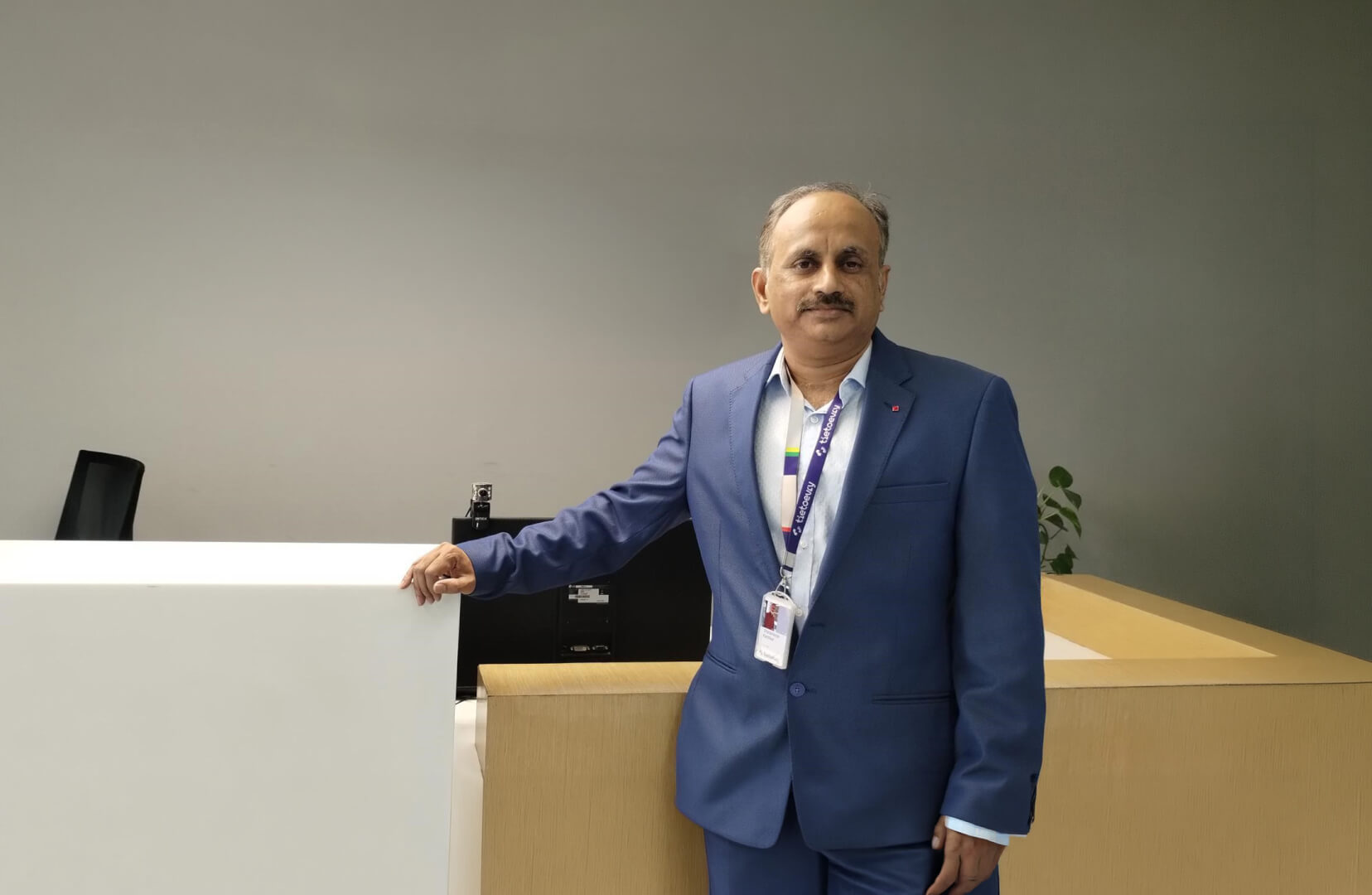 Sharanayya Kantikar standing in Tietoevry office