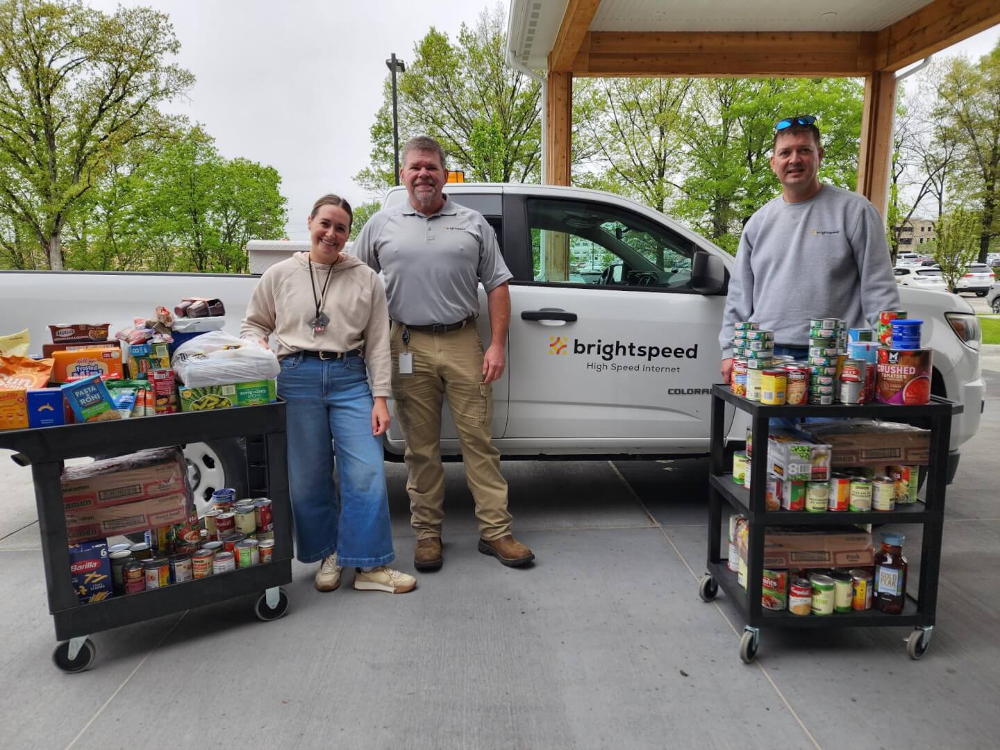 Person picking up a plastic bottle during a cleanup.