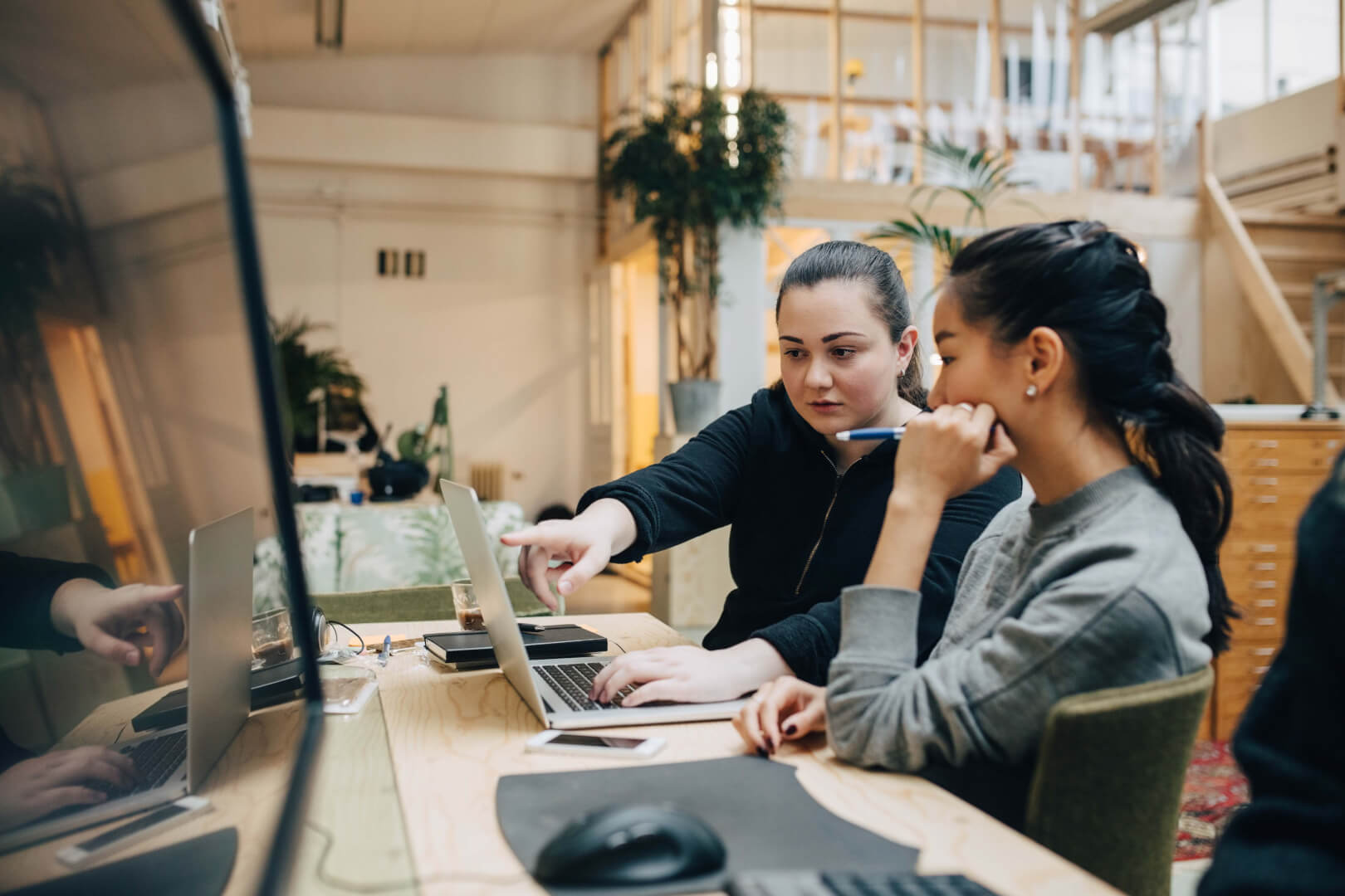 Two girls working together