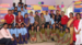 group in India in front of multi-color background