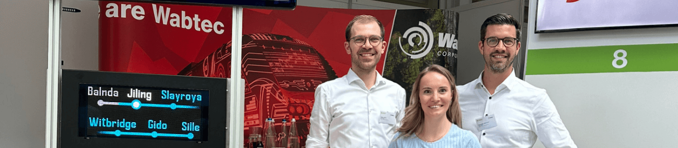 Tobias with co-workers at trade show