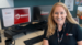 Jackie at her desk smiling