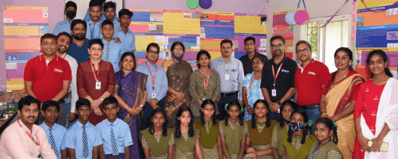group in India in front of multi-color background